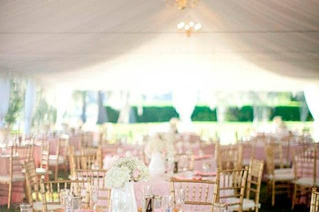Chiavari chairs under our white tent