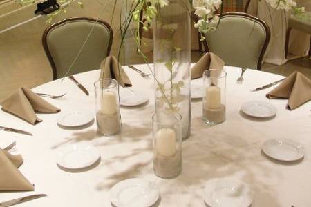 Tall all white centerpiece - orchids, stock, hydrangeas