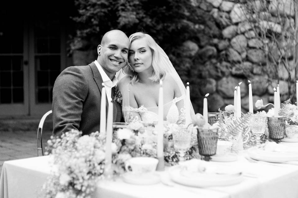 Couple sitting at a decorated table