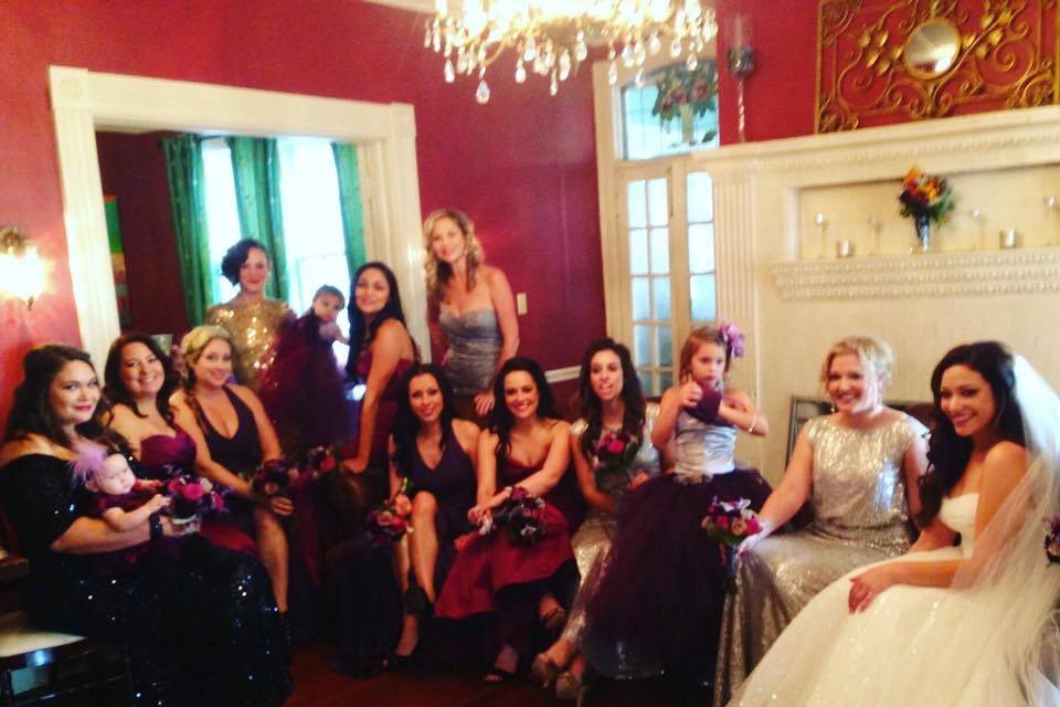 Behind the scenes photo of bride and bridal party