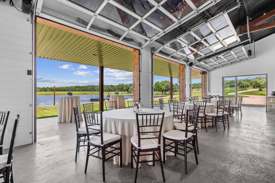 Garage doors open to lake