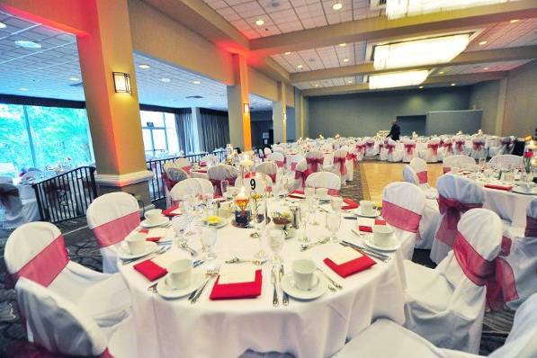 Our Chair Covers with Apple Red Sashes for a wedding at the Handlery Hotel