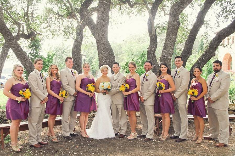 The couple with the bridesmaids and groomsmen