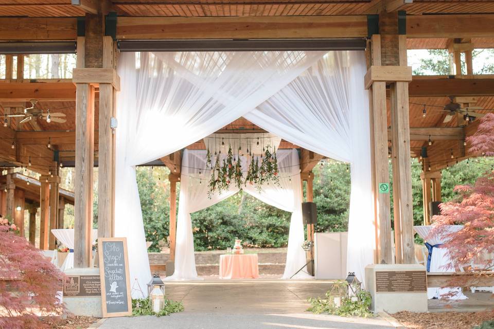 Draping and custom chandelier | Photo Credit: Eric & Jamie Photography
