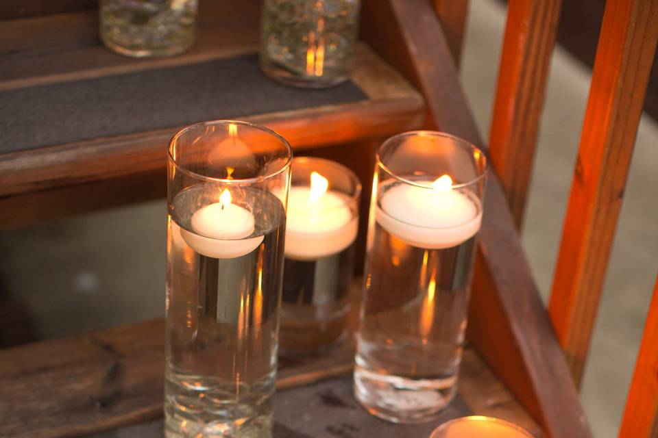 Candlelit inside the tall glass