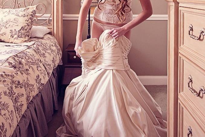 Gorgeous ivory corset set goes great with this strapless bridal gown.
Image by Raw Photo Design