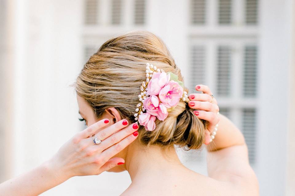 Flower hair ornament on an elegant updo