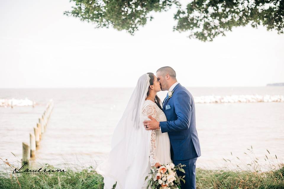 Bride and groom waterfront