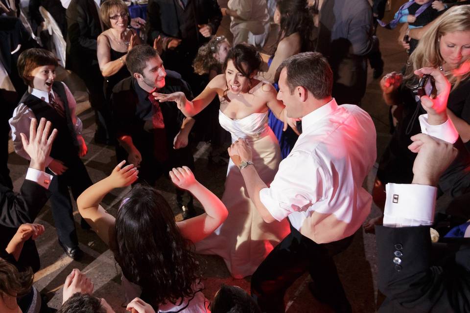 The couple and their guests dancing