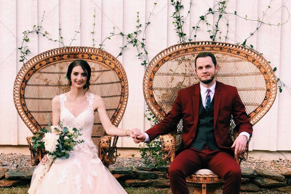 Bride and groom on their chairs