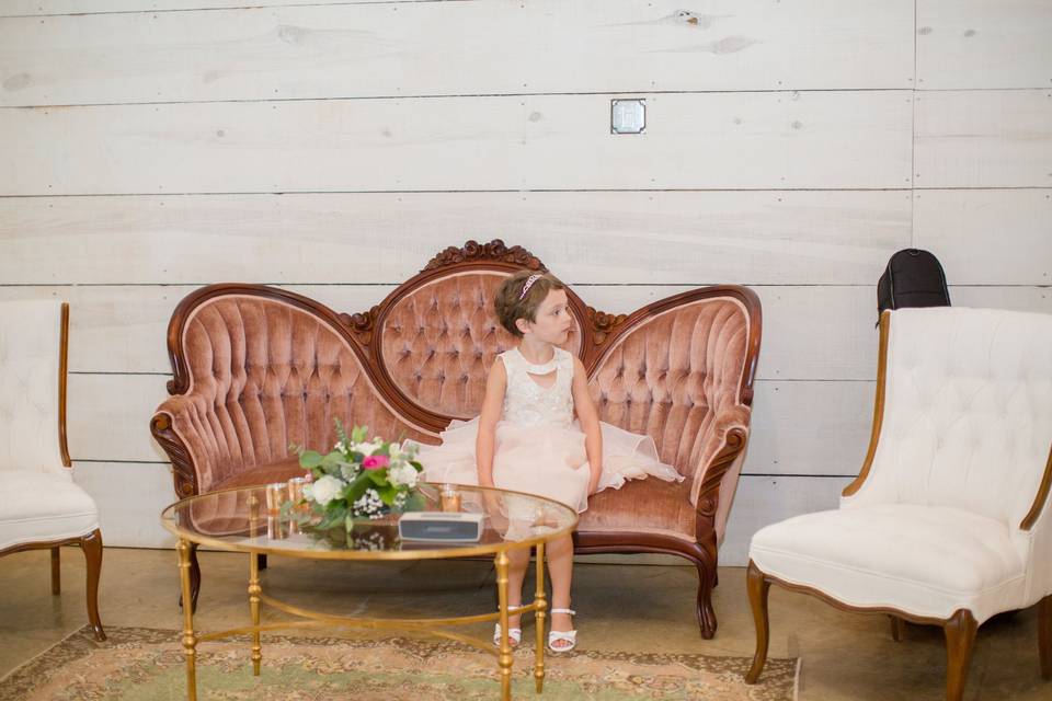 Flower girl on the chaise lounge