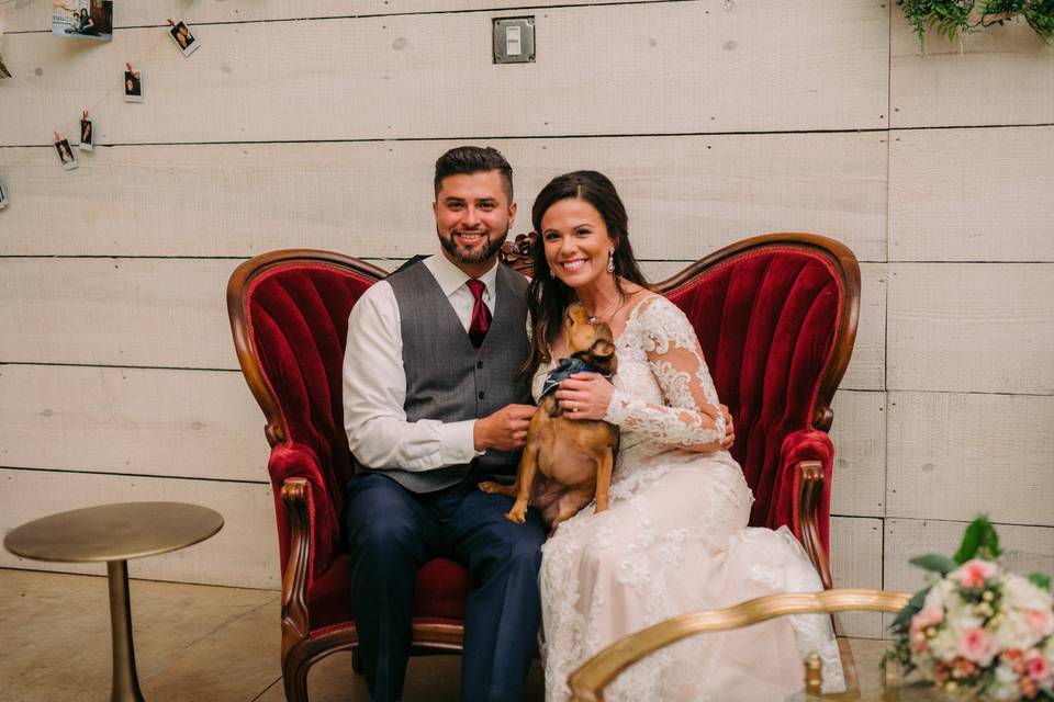 Newlyweds on vintage loveseat