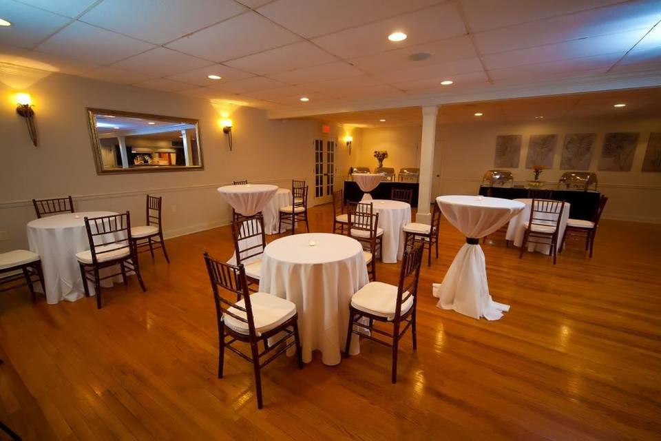 white table and chiavari chairs