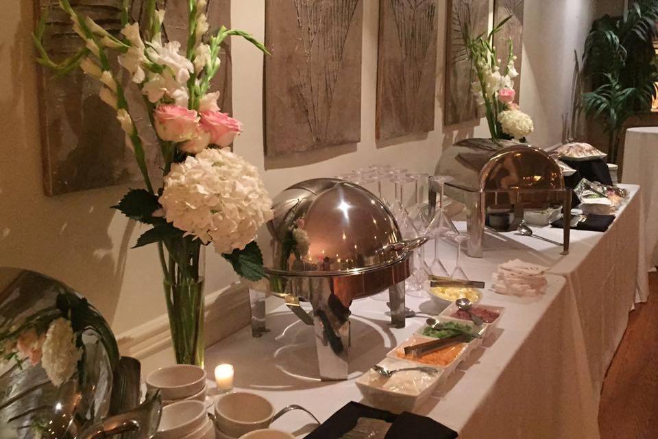 Buffet table with floral centerpiece