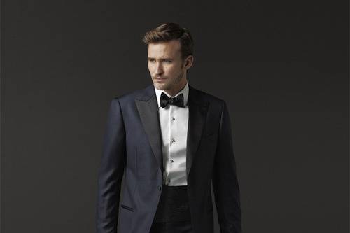The J. Hilburn Midnight Blue tuxedo is a very fresh look a la Hugh Jackman and Daniel Craig. This jacket features a grosgrain peak-lapel, but you design your tux to your preference.
