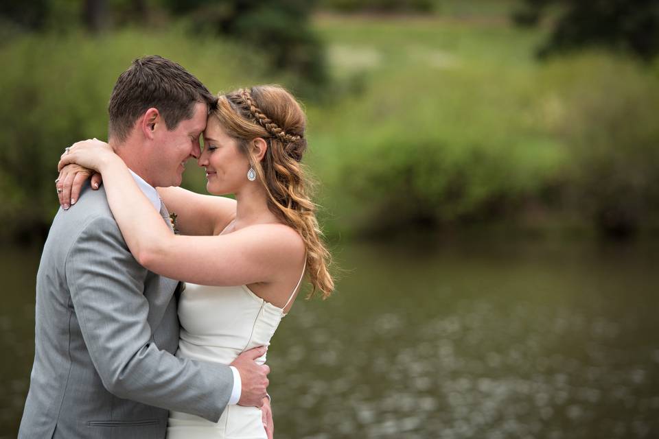 A wedding at Lower Lake Ranch, in the foothills of Pine Colorado.  This was an intimate moment that I let happen naturally to get real expressions of their love for each other.