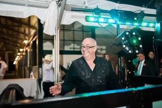 Wedding Entertainment Specialist Bert Lindsay provides DJ & Emcee services at a 2016 wedding.