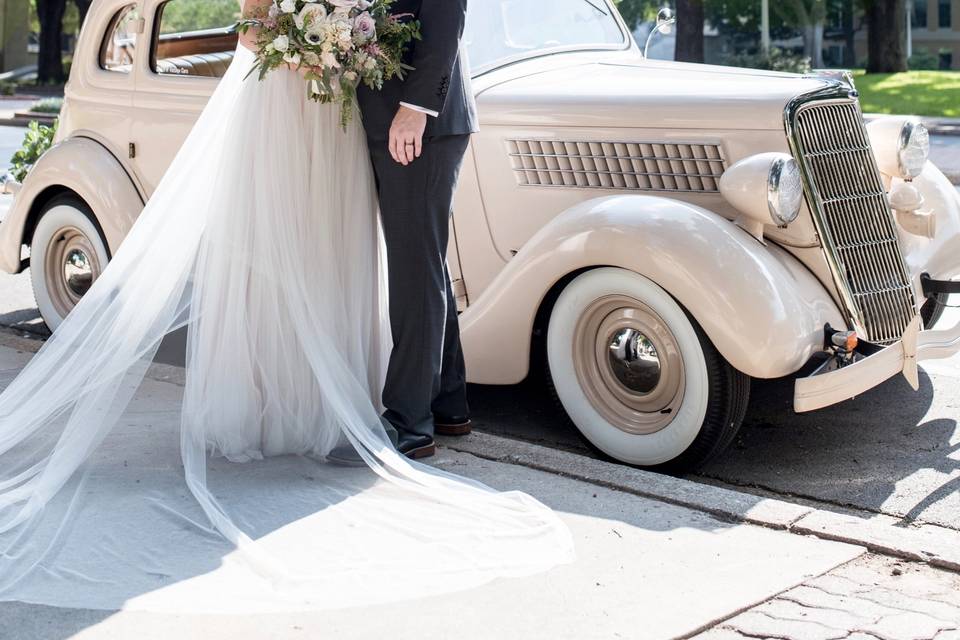 Standing beside a 1935 Ford