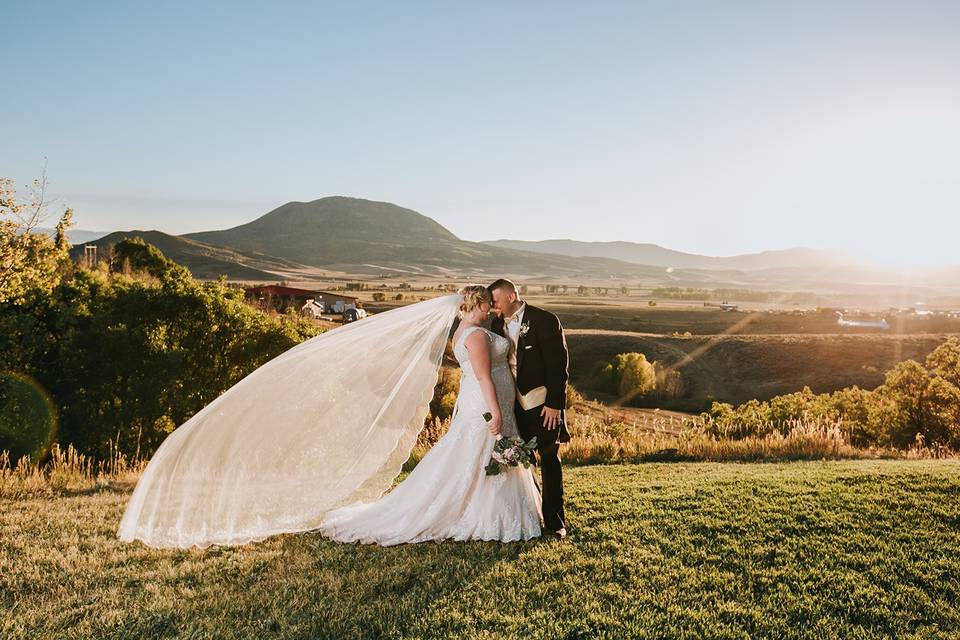 Bride and groom kissing