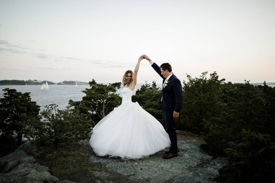 Groom twirling his bride