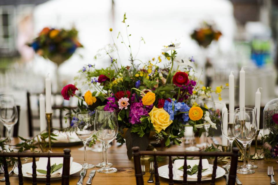 Flowers on top of suitcases