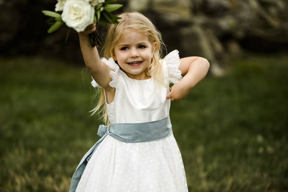 Bride, bridesmaids, and flower girl