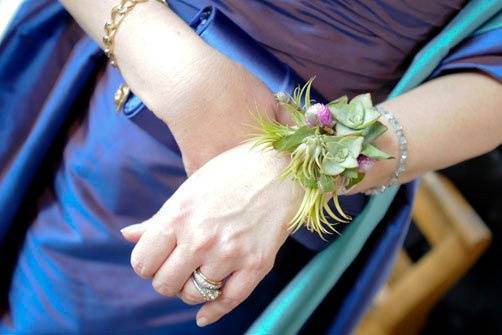 Succulent and air plant corsage.Photo by Jennifer Lindberg Weddings.