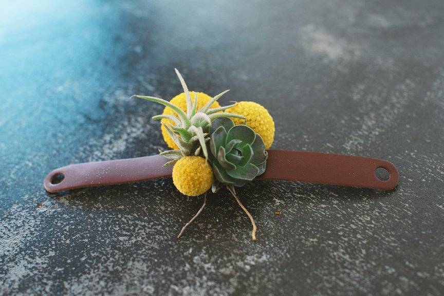 Succulent and air plant corsage. Photo by Nathan Russell Photo.