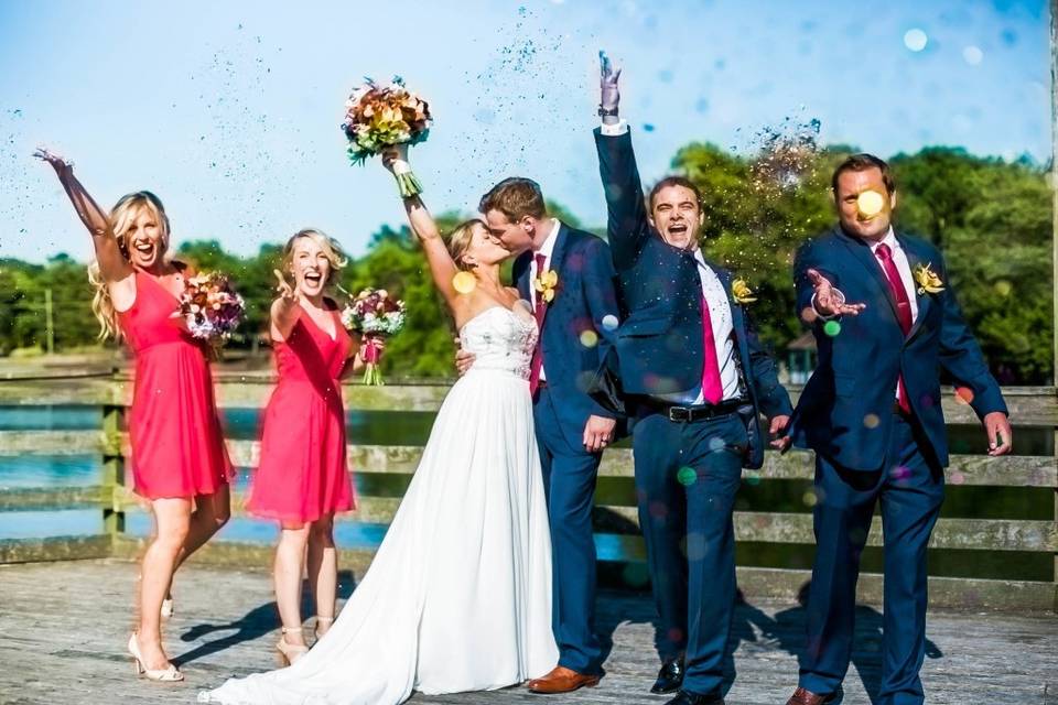 Couple with their bridal attendants