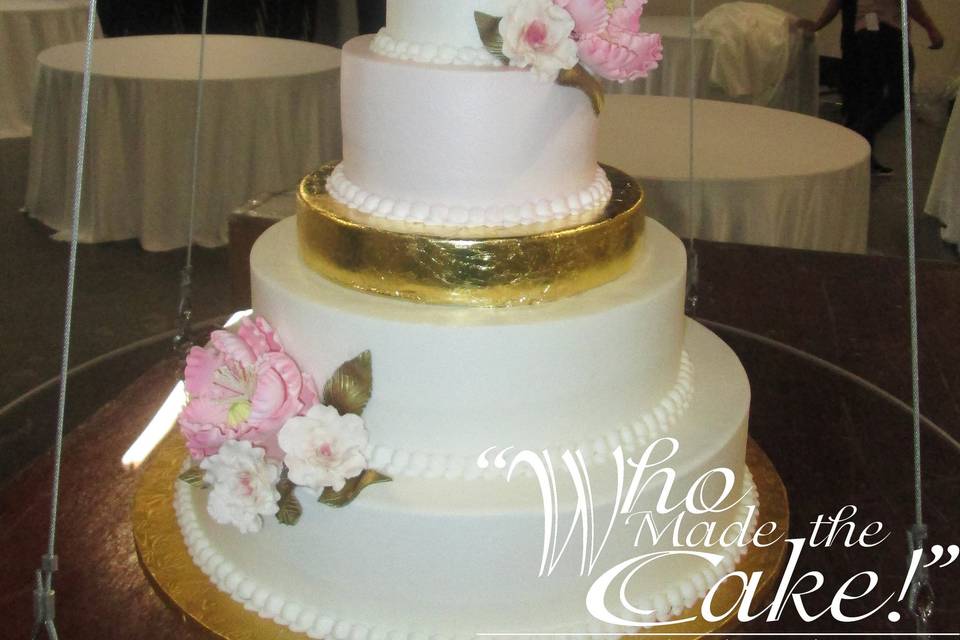 Wedding cake with gold leaf