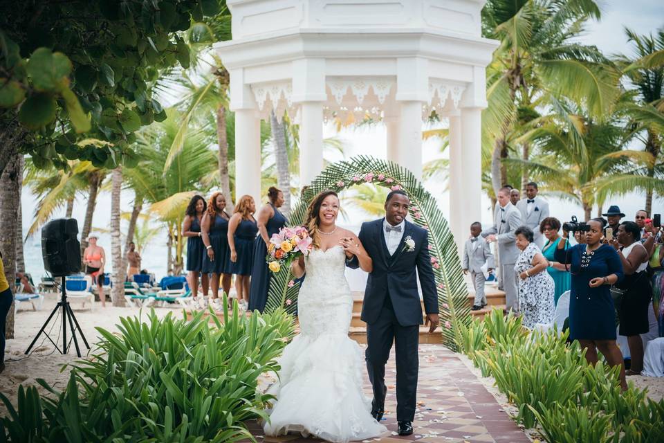 Wedding recessional in tropical landscape