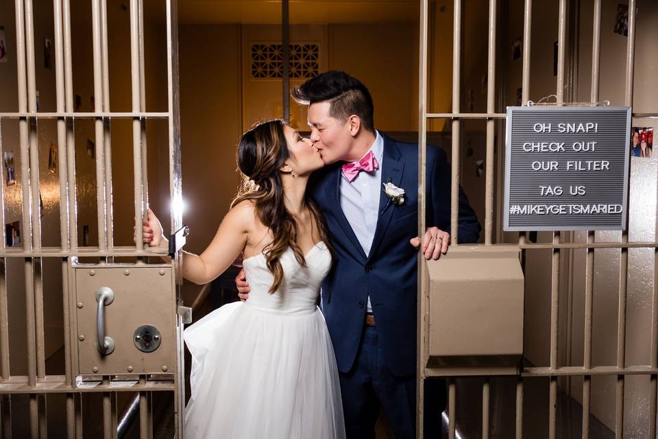 Couple kissing in jail cell
