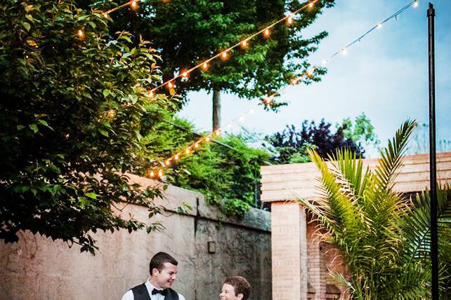 Newlyweds in courtyard