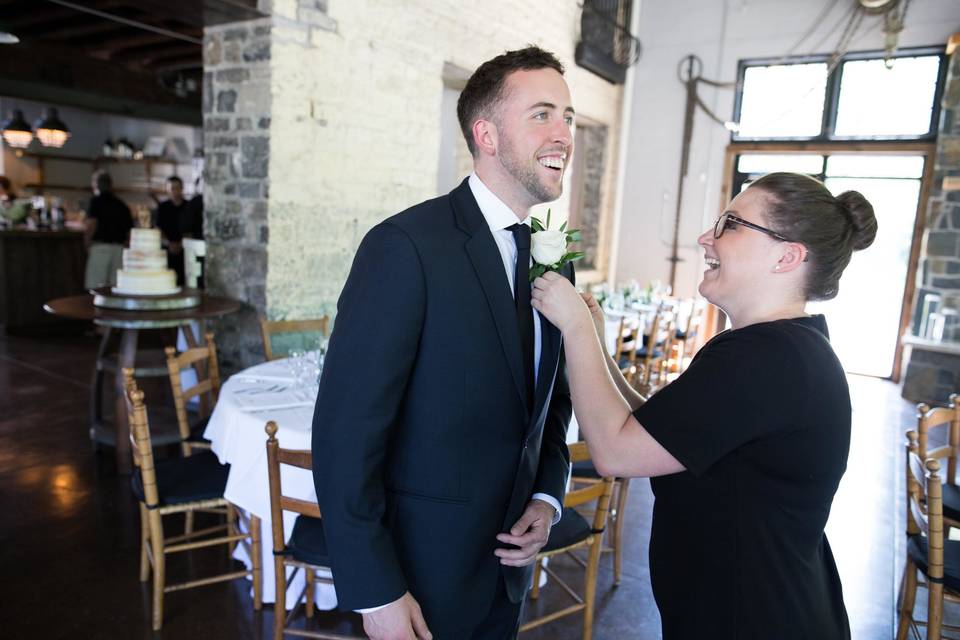 Pinning the boutonniere