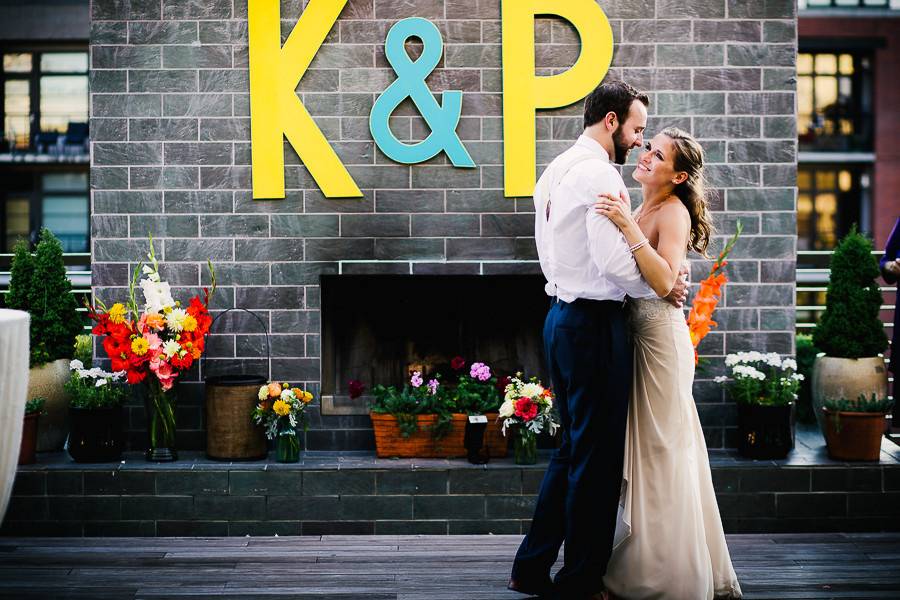 Newlyweds dance on the rooftop