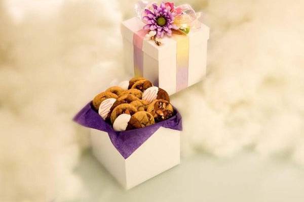 Elegantly packaged in a white box, tied with beautiful organza ribbon, and finished with a floral motif accent. Inside this sophisticated box you will find an array of 28 of our gourmet cookies. Only the finest of ingredients are used in our cookies, you will experience the difference between Heidi's Heavenly Cookies and imitations.
http://www.heidisheavenlycookies.com/products/Heavenly_Array-14-7.html