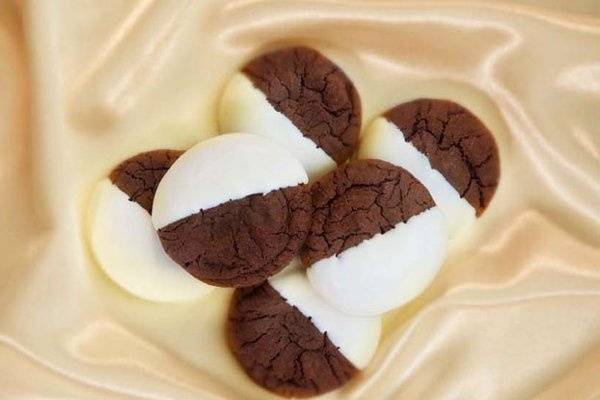 Heidi's Heavenly Chocolate Eclipse Cookies are an even more delectable version of the elegant black and white cookies.
http://www.heidisheavenlycookies.com/products/Chocolate_Eclipse-26-5.html