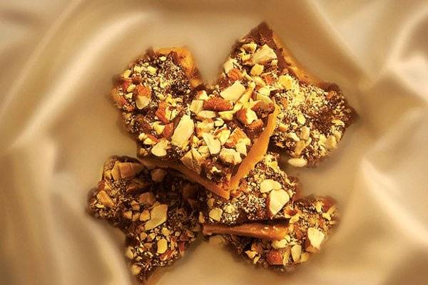 Heidi's Heavenly Cookies also creates an irresistible English Toffee Candy that customers crave. Enticing, crunchy toffee candy is topped with silky chocolate and buttery almonds for a surprising texture that's truly divine.
http://www.heidisheavenlycookies.com/products/English_Toffee_Candy-28-5.html