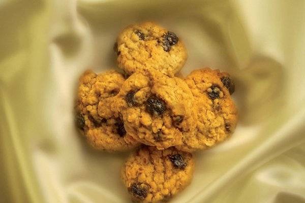 Heidi's Heavenly oatmeal cookie has a surprisingly complex and evocative flavor.  They have the familiar taste of oatmeal raisin cookies, but the secret family recipe creates a surprisingly moist homemade oatmeal batter filled with plump, juicy raisins.
http://www.heidisheavenlycookies.com/products/Oatmeal_Raisin-27-6.html