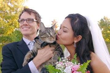 This delightful couple brought their cat in a bow tie to be their witness for their wedding at the circle in Forest Park, a lovely place for a small wedding.