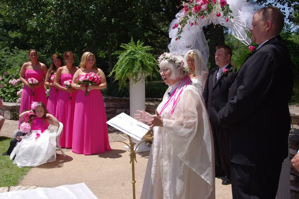 There's always a  Critic--notice the flower girl in this lovely wedding in Bee Tree Park.