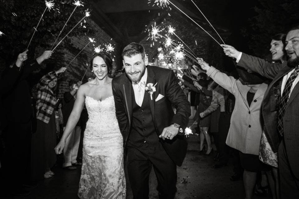 Newlywed couple sparkler exit