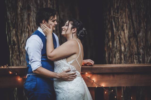 Bride and groom stare.