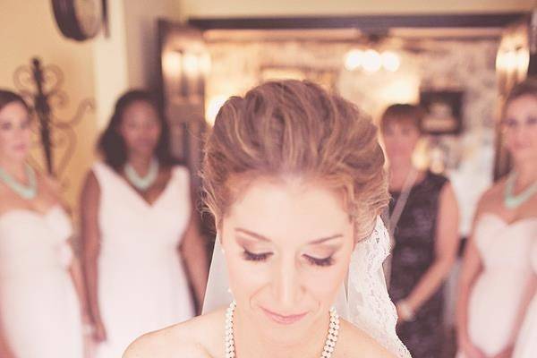 Bride looking in a mirror