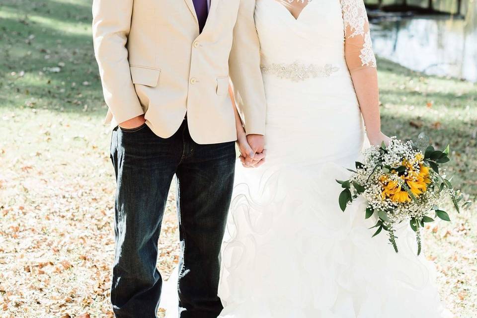 Bride leaning on her groom