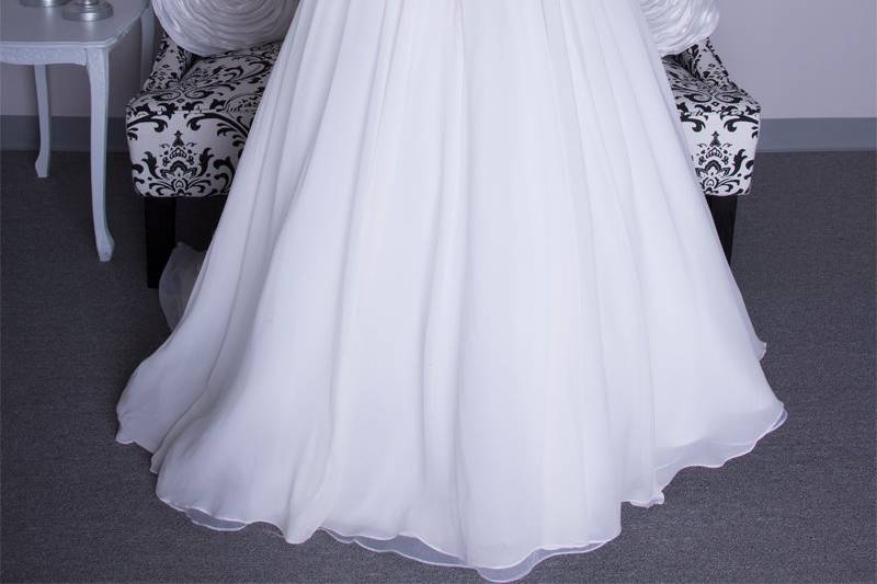 ChloeStyle Name:  AR66 ChloeSilk Chiffon. Ball gown with gathered skirt and cathedral length train.  Strapless sweetheart neckline with natural waist and draped bodice.  Gown is accented with crystal beading and floral detail at natural waist and three dimensional detail.