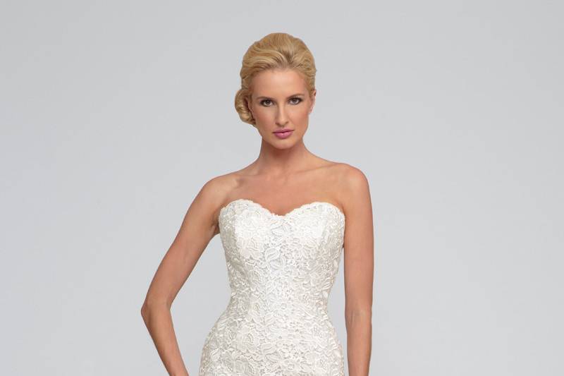 Indira	Italian Giupure lace and sparkle tulle.  Trumpet gown with chapel length train and sweetheart neckline.  Matching guipure lace jacket available upon request.