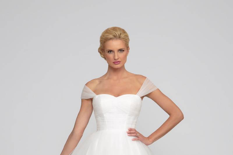Nancy	Tulle.  Natural waist full A-line gown with chapel length train.  Sweetheart neckline with pleated bodice and crisscross detachable straps.
