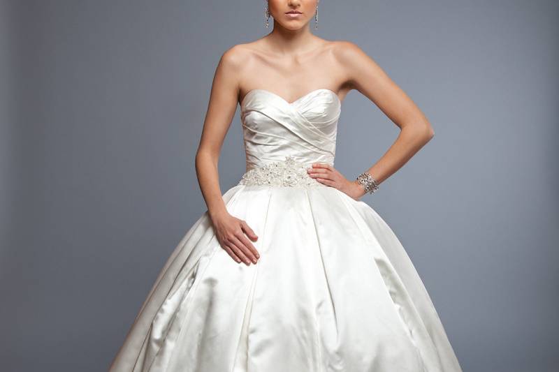 VanessaBMW Silk Satin.  Ball Gown.  Sweetheart neckline with natural waist and draped bodice.  Skirt has inverted pleats and gown is accented with crystal beading, embroidery, and three dimensional ribbon detail.