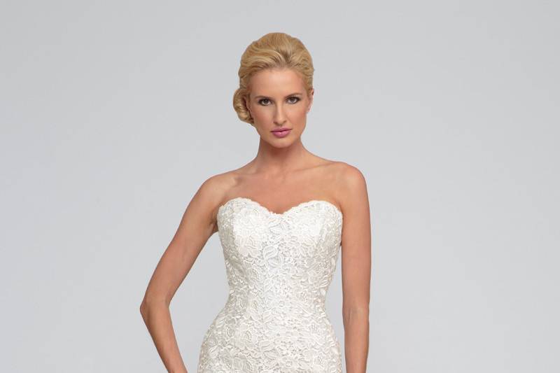 Indira	  Italian Giupure lace and sparkle tulle.  Trumpet gown with chapel length train and sweetheart neckline.  Matching guipure lace jacket available upon request.